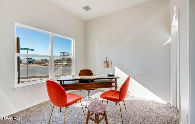 view of carpeted dining room