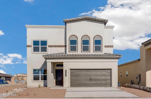 view of front of property with a garage