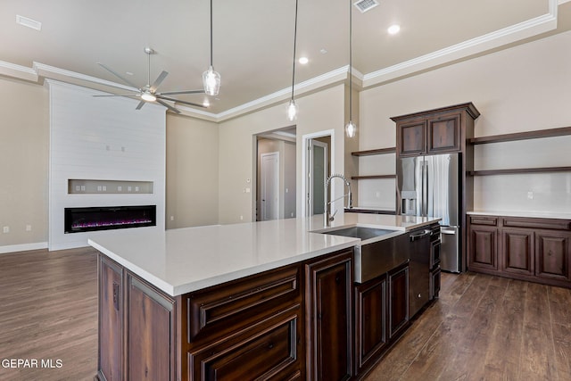 1848 Cimarron Park Dr, El Paso, TX 79911 - kitchen with crown molding, open shelves, stainless steel refrigerator with ice dispenser, and a sink