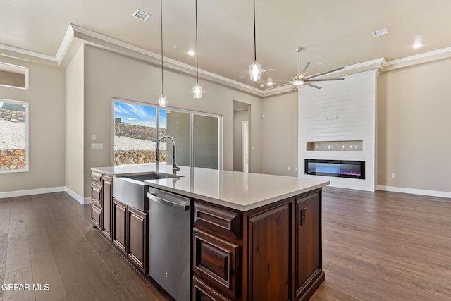 1848 Cimarron Park Dr, El Paso, TX 79911 - kitchen with ceiling fan, a sink, dark wood finished floors, stainless steel dishwasher, and ornamental molding