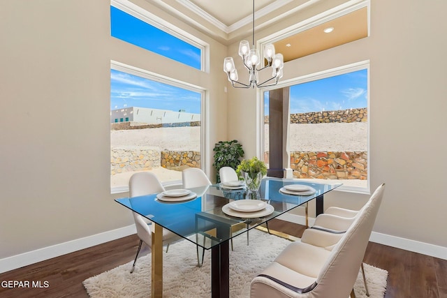 1848 Cimarron Park Dr, El Paso, TX 79911 - dining space featuring crown molding, baseboards, wood finished floors, and a notable chandelier