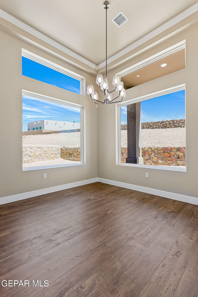 1848 Cimarron Park Dr, El Paso, TX 79911 - unfurnished room featuring a chandelier, ornamental molding, wood finished floors, and visible vents