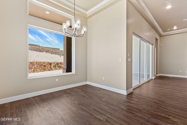 1848 Cimarron Park Dr, El Paso, TX 79911 - spare room with dark wood finished floors, baseboards, a chandelier, ornamental molding, and recessed lighting