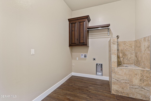 1848 Cimarron Park Dr, El Paso, TX 79911 - washroom featuring cabinet space, washer hookup, electric dryer hookup, baseboards, and dark wood-type flooring