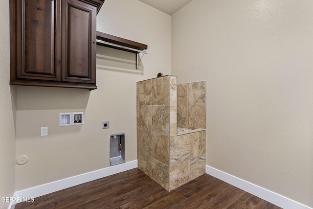 1848 Cimarron Park Dr, El Paso, TX 79911 - washroom featuring cabinet space, dark wood-style flooring, washer hookup, electric dryer hookup, and baseboards