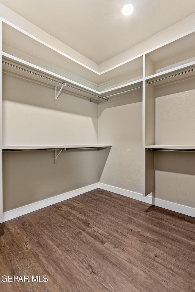 1848 Cimarron Park Dr, El Paso, TX 79911 - walk in closet featuring wood finished floors