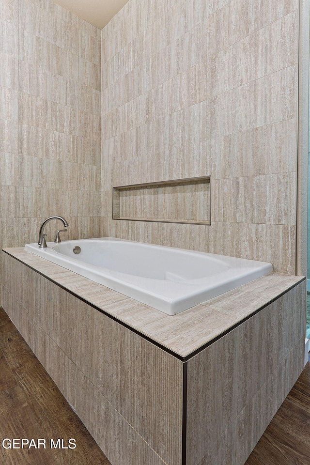 1848 Cimarron Park Dr, El Paso, TX 79911 - full bath with wood finished floors and a garden tub