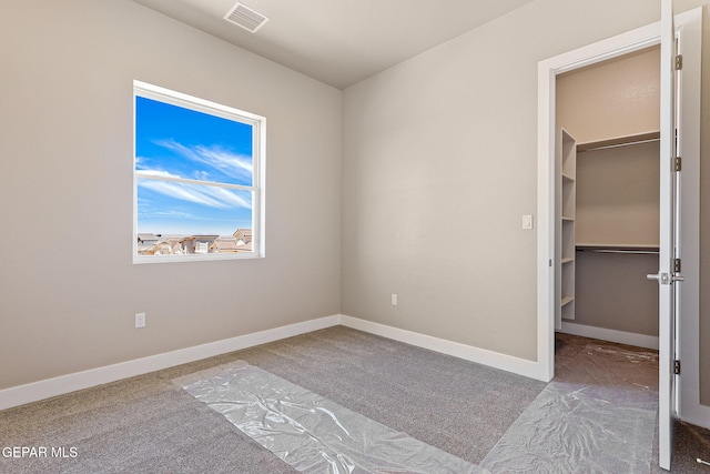 1848 Cimarron Park Dr, El Paso, TX 79911 - unfurnished bedroom featuring carpet floors, baseboards, visible vents, and a spacious closet
