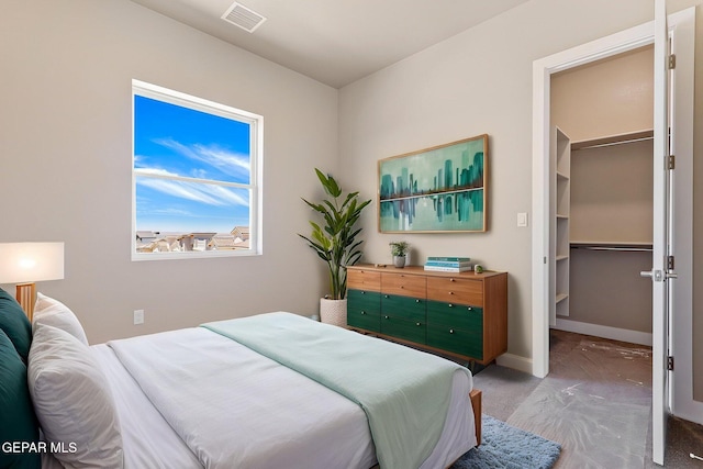 1848 Cimarron Park Dr, El Paso, TX 79911 - carpeted bedroom with baseboards, visible vents, and a spacious closet
