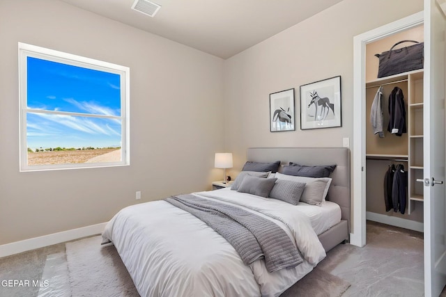 1848 Cimarron Park Dr, El Paso, TX 79911 - bedroom with a walk in closet, light colored carpet, and visible vents