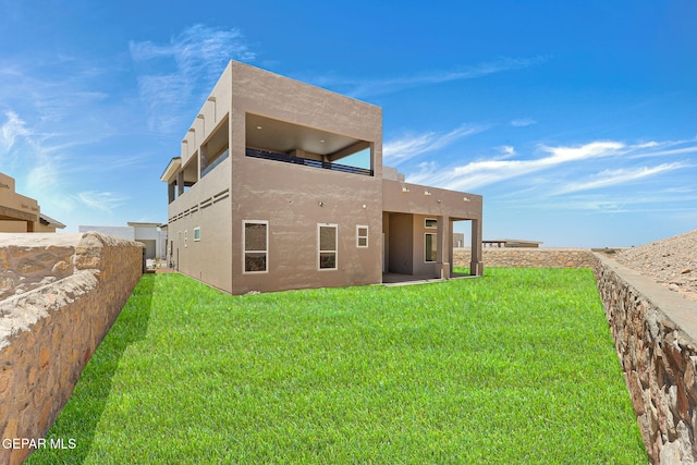 1848 Cimarron Park Dr, El Paso, TX 79911 - back of property featuring stucco siding and a yard