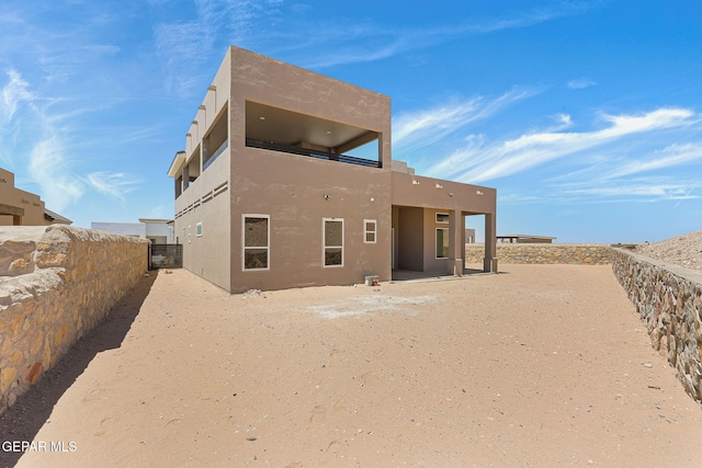 1848 Cimarron Park Dr, El Paso, TX 79911 - rear view of property with a fenced backyard, a patio, and stucco siding