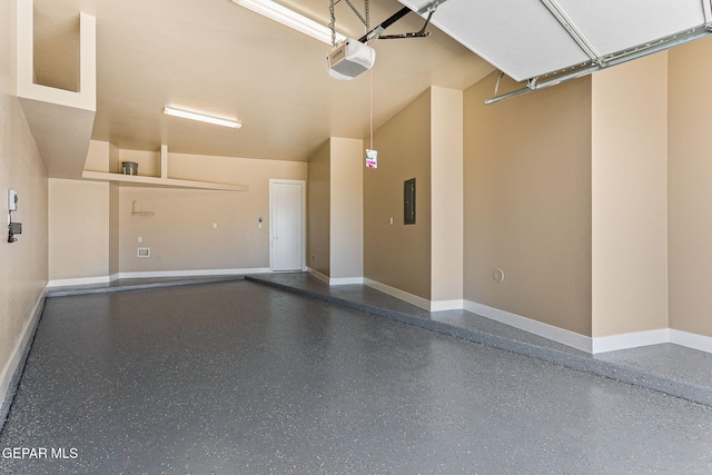 1848 Cimarron Park Dr, El Paso, TX 79911 - garage with baseboards and a garage door opener
