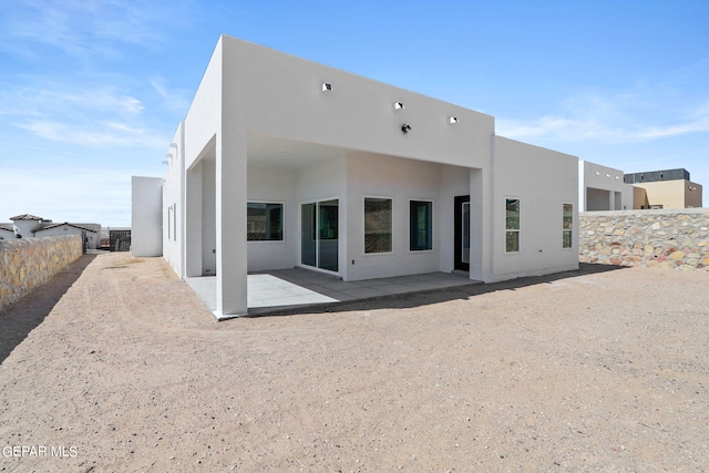 rear view of house with a patio area