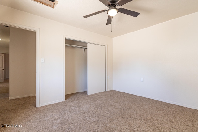 unfurnished bedroom featuring carpet flooring, a closet, and ceiling fan