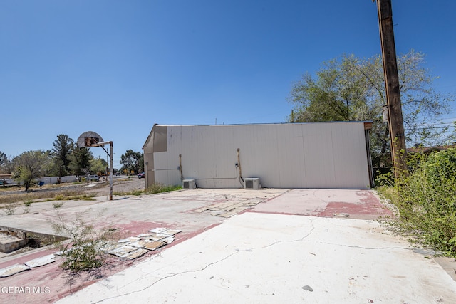 exterior space with basketball hoop