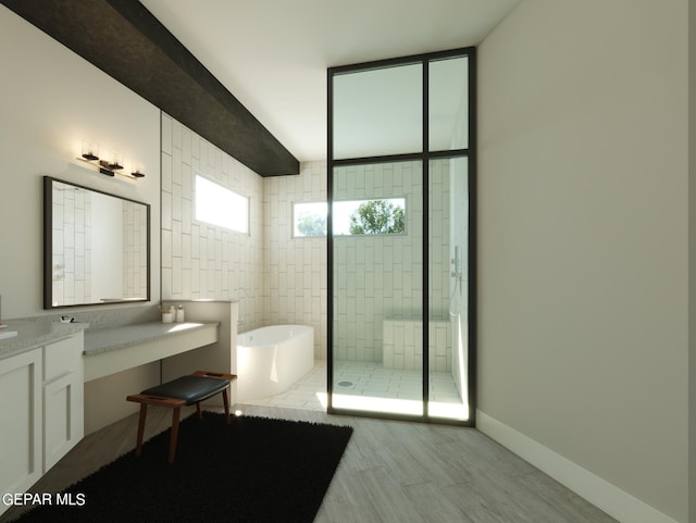 bathroom with hardwood / wood-style flooring, vanity, and separate shower and tub