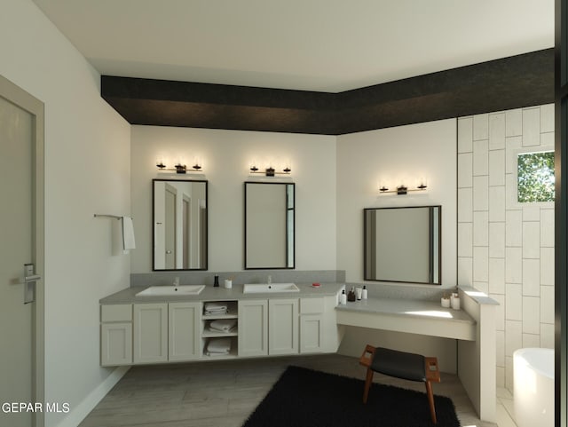 bathroom featuring vanity, a bath, and hardwood / wood-style floors