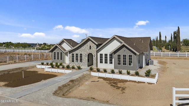 view of front of house featuring a rural view