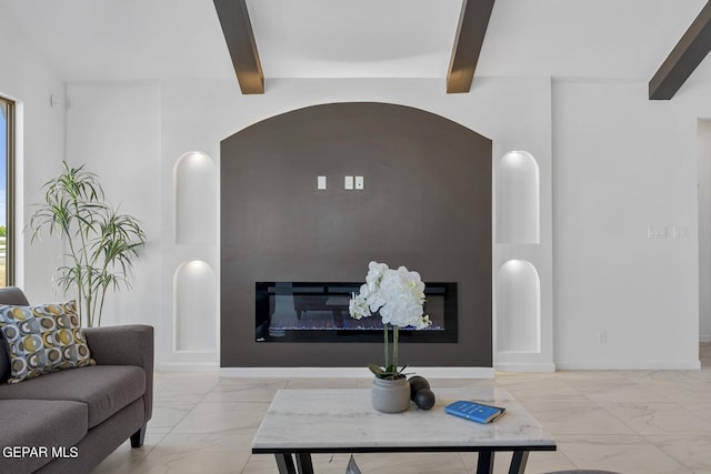 living room with a fireplace and beam ceiling