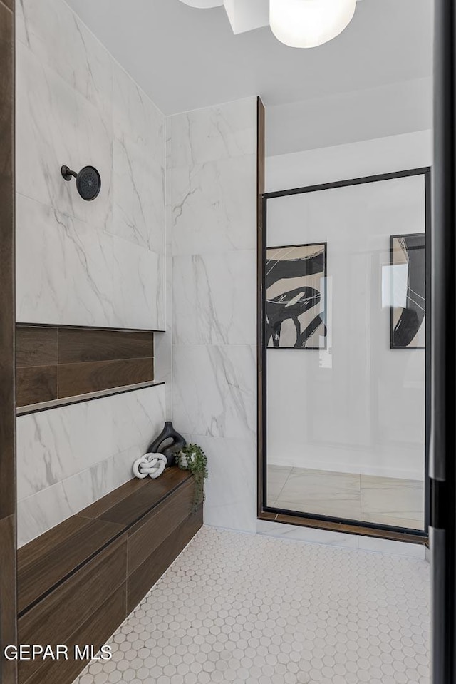 bathroom featuring tile patterned floors and walk in shower