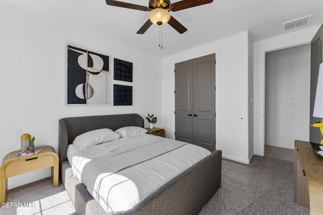 bedroom featuring carpet, a closet, and ceiling fan