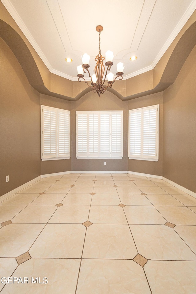 18 Via Placita, El Paso, TX 79927 - spare room with ornamental molding, a chandelier, recessed lighting, light tile patterned flooring, and baseboards