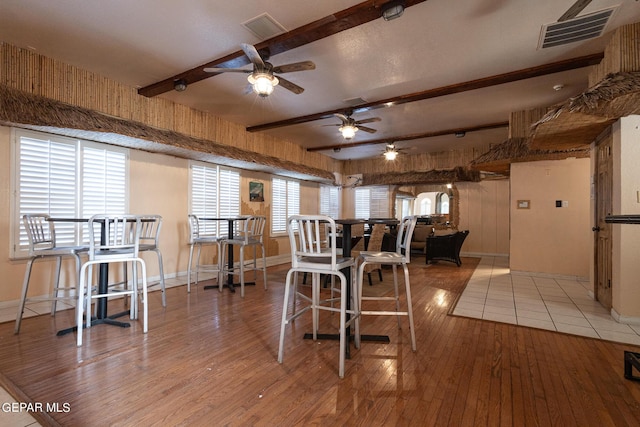 18 Via Placita, El Paso, TX 79927 - dining space featuring beam ceiling, ceiling fan, hardwood / wood-style flooring, and baseboards