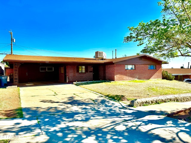 single story home with a carport