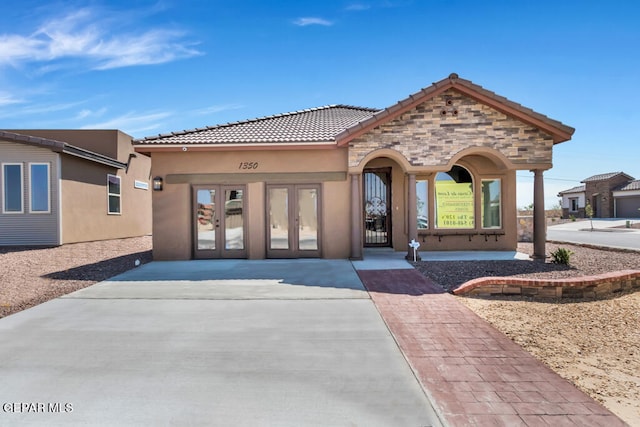 view of front of home featuring french doors