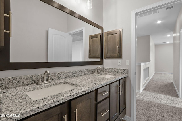 bathroom with double vanity