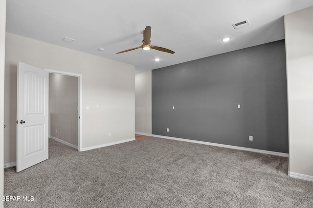 empty room with light carpet and ceiling fan