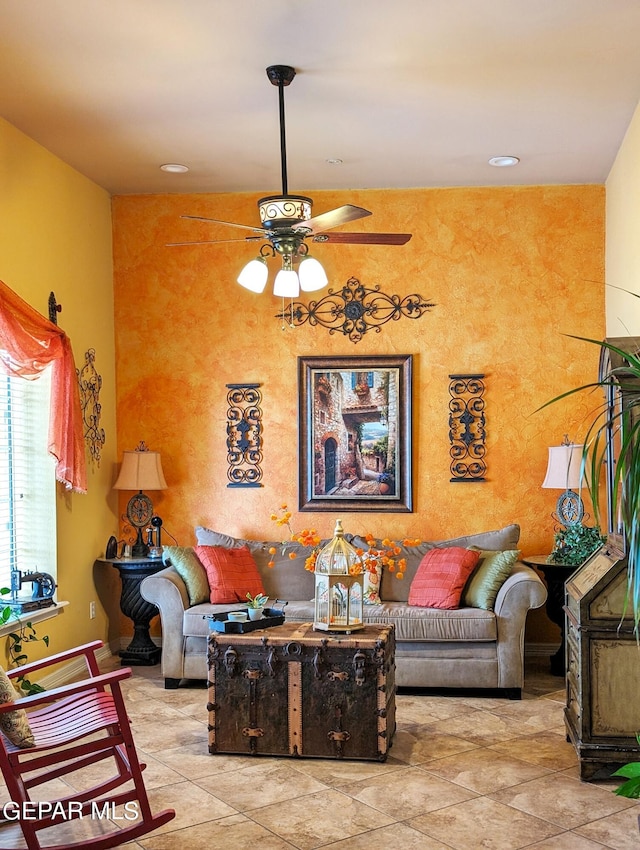 living room with ceiling fan