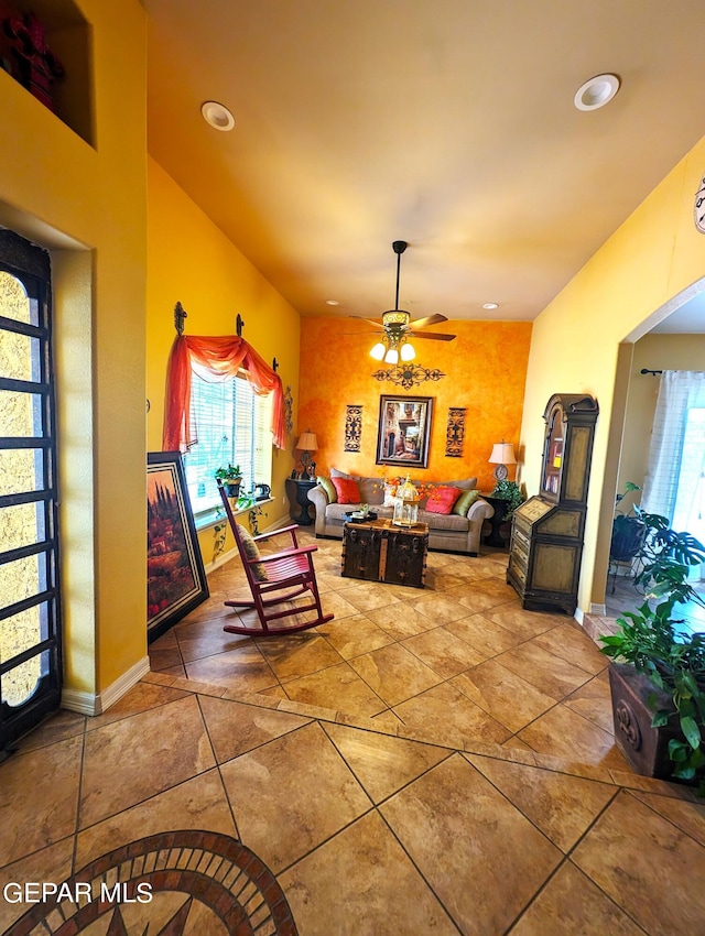 living room with ceiling fan