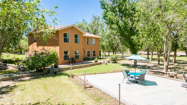 view of nearby features with a patio area and a yard