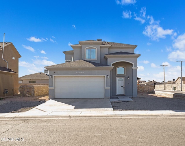 view of front of property featuring a garage