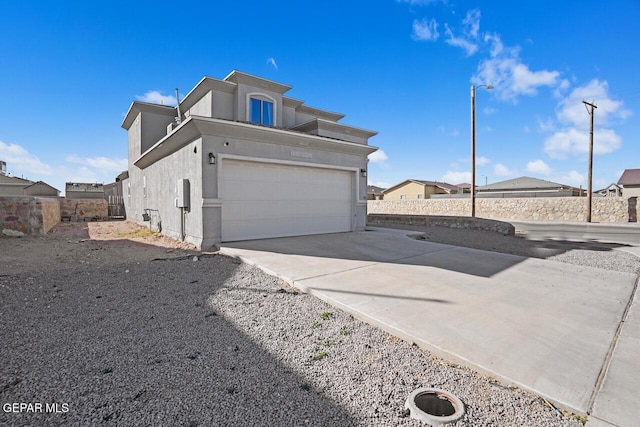 view of front of property featuring a garage