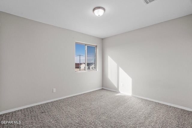 view of carpeted spare room