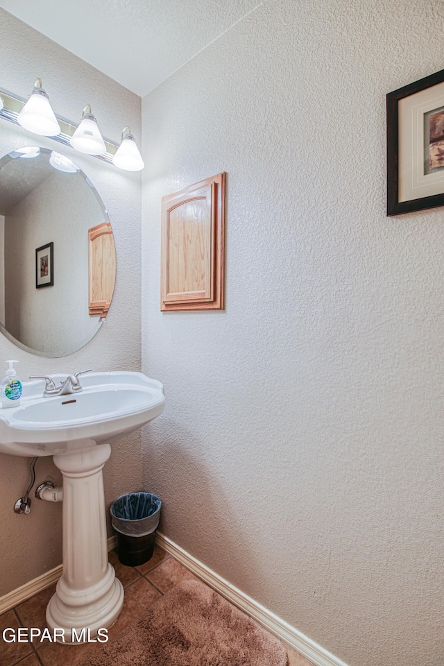 bathroom with tile floors