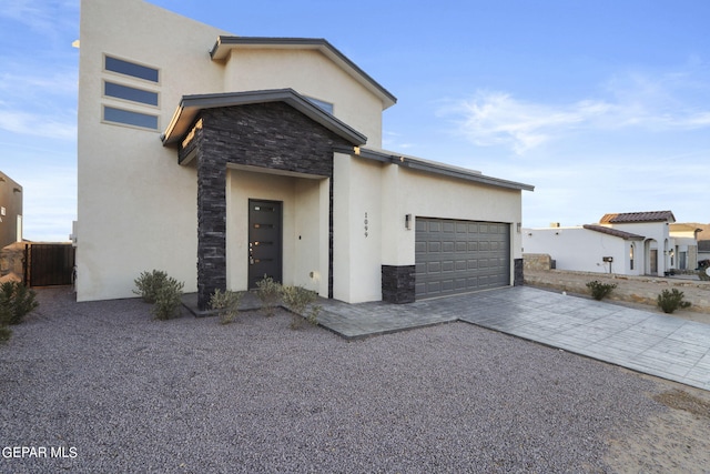 view of front of home with a garage