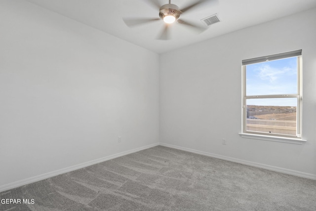 carpeted empty room with ceiling fan