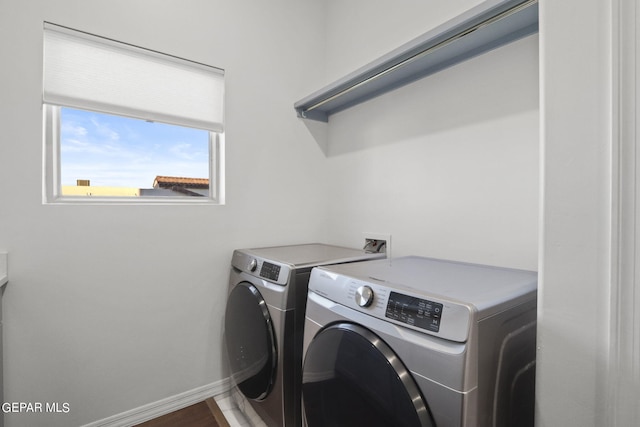 laundry room featuring separate washer and dryer and washer hookup