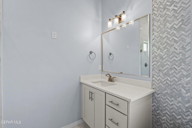 bathroom featuring vanity with extensive cabinet space