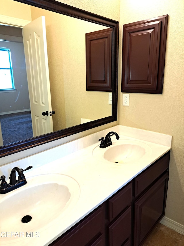 bathroom with double sink vanity