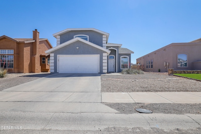 view of front of property with a garage