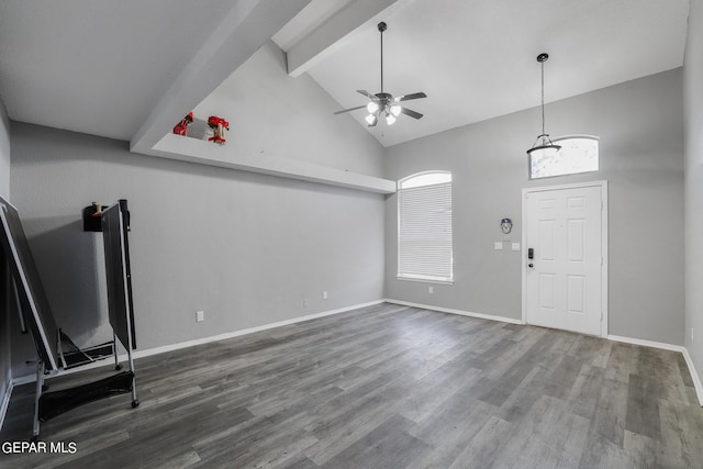 foyer entrance with wood-type flooring, high vaulted ceiling, ceiling fan, and beam ceiling