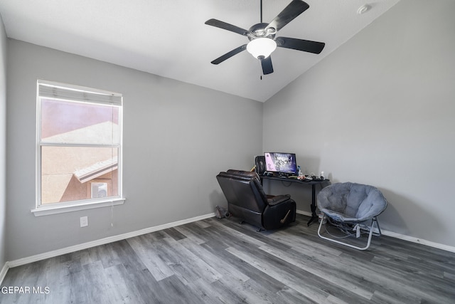 office featuring hardwood / wood-style flooring, ceiling fan, and vaulted ceiling