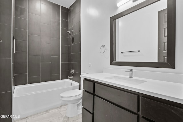 full bathroom with tiled shower / bath combo, vanity, tile floors, and toilet