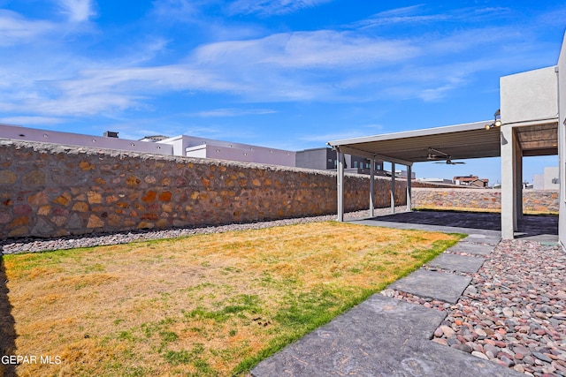 view of yard featuring a carport