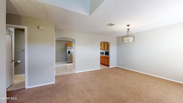 interior space featuring a textured ceiling